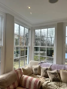 white timber sliding window